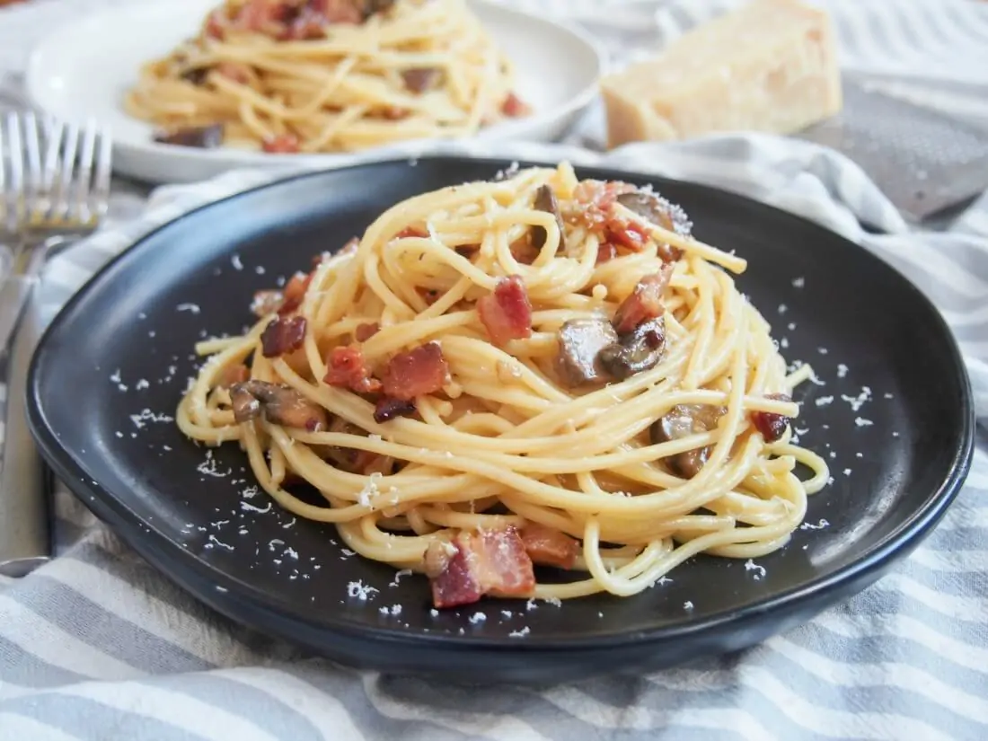 Spaghetti alla carbonara with  mushrooms 