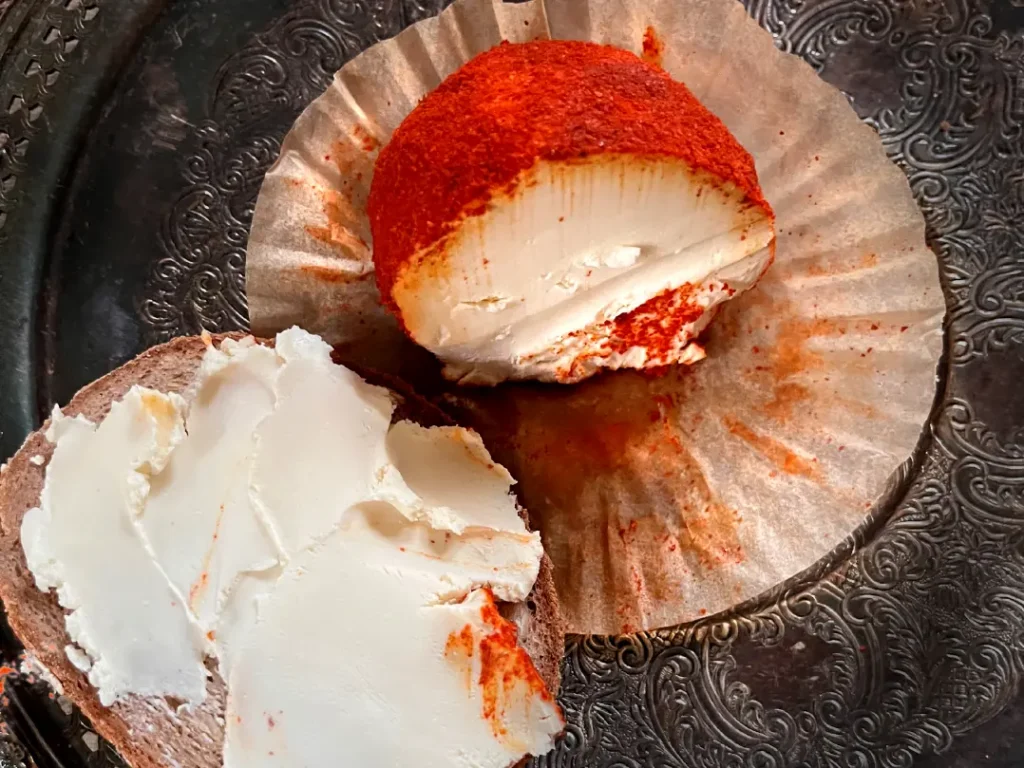 Use of Paprika in Italian Food: soft, creamy cheese with a dusting of paprika on the rind