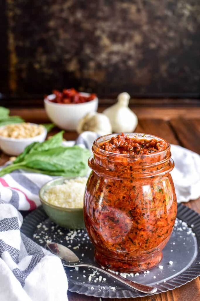 Choosing the right toppings to pair with Sun Dried Tomato Pesto