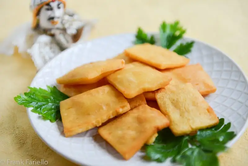 Popular Italian food originated in Sicily Panelle (chickpea fritters) 